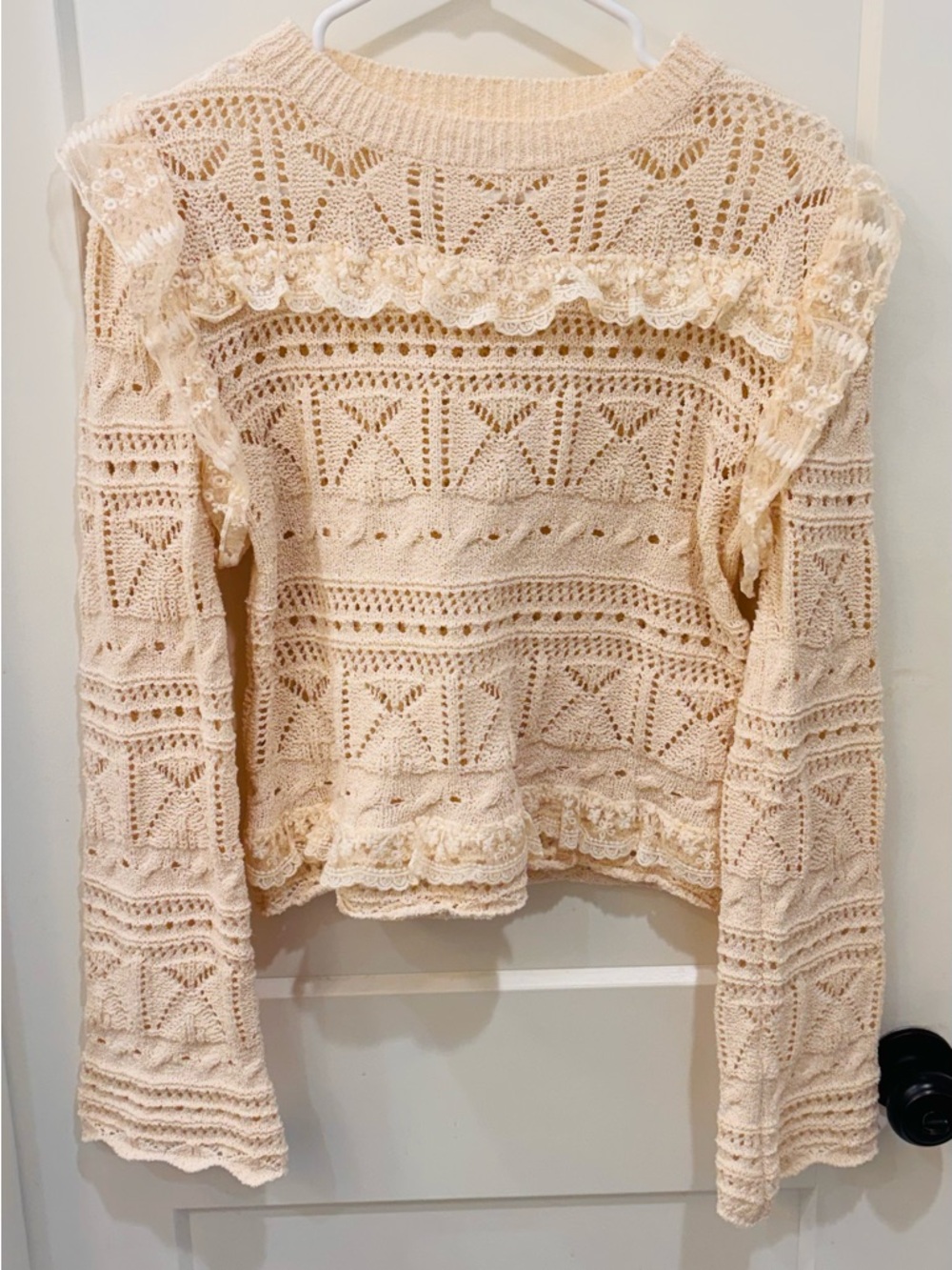 Blue Ivy Cream Crochet Lace Ruffle Sweater. Size large and a mint condition.